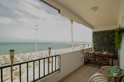 a balcony with a view of the ocean at FLH Quarteira Seaview in Quarteira