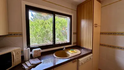 a bathroom with a sink and a window at Sun by Check-in Portugal in Albufeira