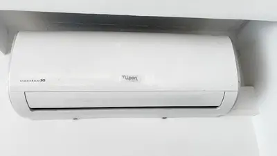 a close up of a microwave oven with the word mph at Tenis, Golf e Mar in Quarteira