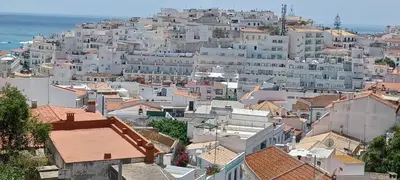 an aerial view of a city with white buildings at Apart SEA and OLD TOWN VIEWS in Albufeira