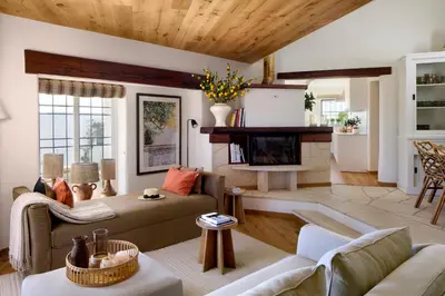 a living room with a couch and a fireplace at Casa Rosa dos Ventos in Guia