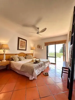 a bedroom with a bed in a room with at Amazing T3 -Clube Albufeira in Albufeira