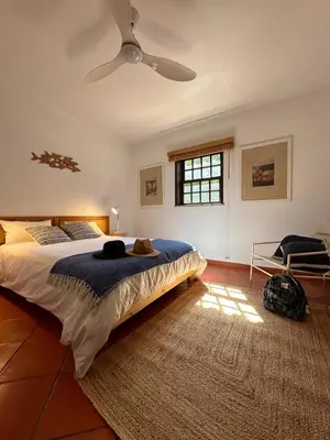 a bedroom with a bed and a ceiling fan at Amazing T3 -Clube Albufeira in Albufeira
