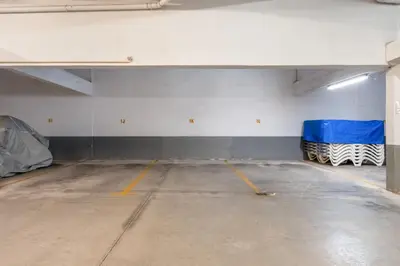 an empty garage with a room with blue and white walls at Pearl Harbor 3 BDR Flat VLM Marina by LovelyStay in Quarteira