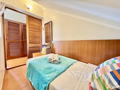 a bedroom with a bed with towels on it at Vilamoura Marina View 3 by Homing in Vilamoura