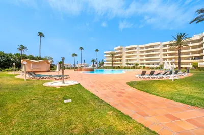 a resort with a swimming pool and a large building at Apartment Galé Mar By Zimzala & Bedzy in Guia