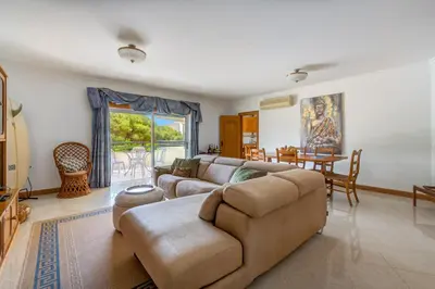 a living room with a couch and a table at Apartment Galé Mar By Zimzala & Bedzy in Guia