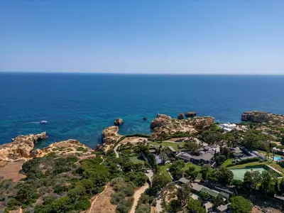 an aerial view of a resort on the ocean at Sao Rafael TownHouse with Pool in Albufeira