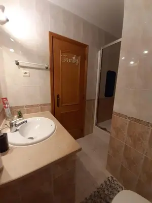 a bathroom with a sink and a shower at Villa David in Albufeira