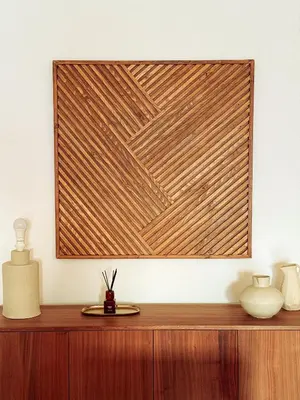a wooden screen on top of a wooden cabinet at Casa Vaga - Garrão beach House