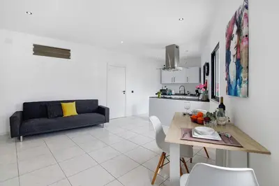 a living room with a couch and a table at Mi Casa Es Su Casa Nº4 in Albufeira