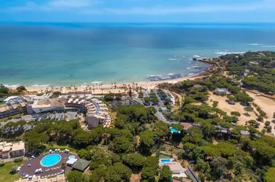 an aerial view of a beach and the ocean at Balaia Retreat - Nature & Beach in Olhos de Água