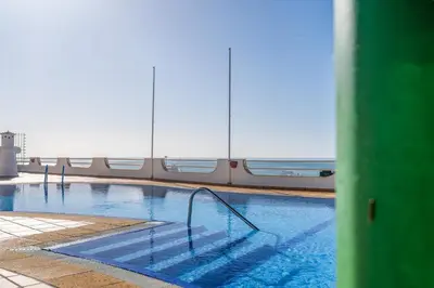 a swimming pool on top of a cruise ship at Prestige Flat by Albufeira Holidays in Albufeira