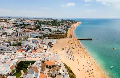 an aerial view of a beach in a coastal town at Sea Side in Albufeira