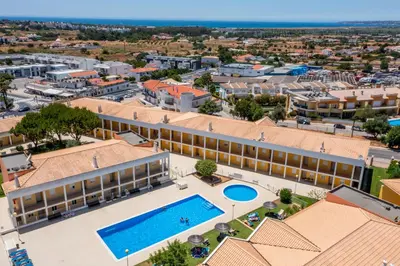 an aerial view of a resort with a swimming pool at Encosta Sao Jose - Apartment V in Albufeira
