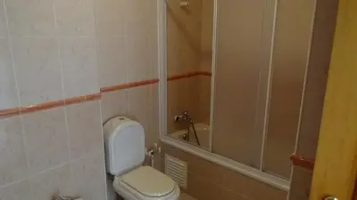 a bathroom with a toilet and a shower at Beach Apartment Vilamoura Villa Columbus in Vilamoura