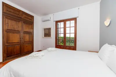 a view of the ocean from the balcony of a villa at Casa Gralheira - Private Pool & Sea View in Albufeira