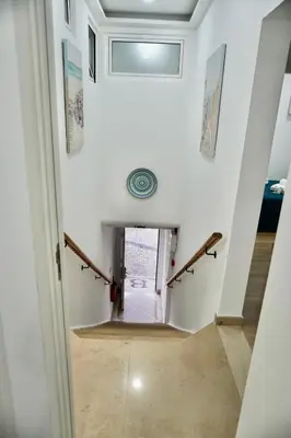 a hallway in a house with a ceiling at Casa Tapada do Bento II- Albufeira in Albufeira