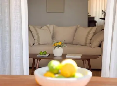 a bowl of fruit on a table in a living room at Vila Antic in Almancil