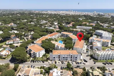 an aerial view of a building with a red heart on it at NEW! Vilamoura Garden View in Quarteira