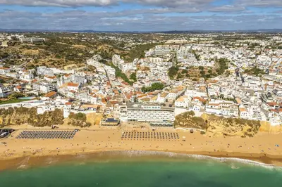 an aerial view of a beach and buildings at Downtown 1 Bedroom Apartment E - 150m from the Beach in Albufeira
