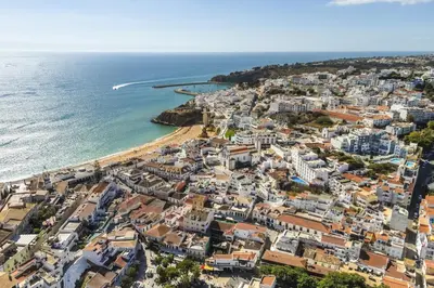 an aerial view of a town next to the ocean at Downtown Studio Apartment F - 150m from the Beach in Albufeira