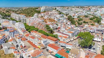 an aerial view of a city with buildings at Downtown Studio Apartment G - 150m from the Beach in Albufeira