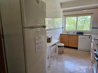 a kitchen with a refrigerator and a sink at Blife Candya private apartment in Monte Negro