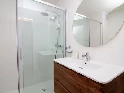 a bathroom with a sink and a shower at Balaia Praia Apartment by Stay ici Algarve Holiday Rental in Albufeira