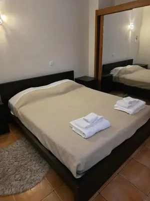 a bed with towels on it in a bedroom at V3 Villa in Albufeira in Albufeira