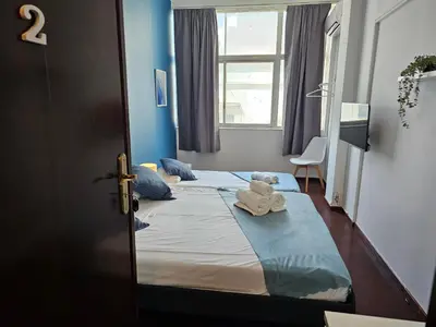 a bedroom with two beds with stuffed animals on it at Blife Tonya - private rooms at Santantonya 1st floor in Faro