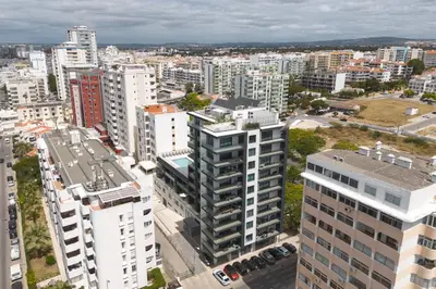 an aerial view of a city with tall buildings at Terracos de Quarteira II Cherry by Real Properties in Quarteira