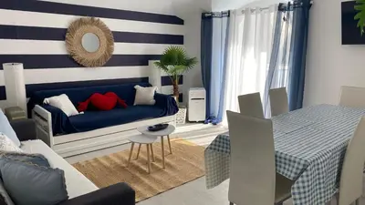 a kitchen with a sink and a microwave at Blue Beach Home with Terrace in Albufeira