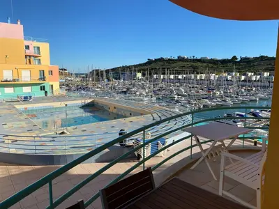 a view of a marina with a bunch of boats at Marina Pool & Sea in Albufeira