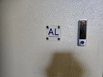 a sign on a wall with an al sign on it at CityComfort in Faro