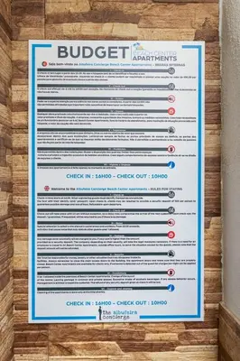 a sign that is on the side of a wall at Budget Beach Center B5 in Albufeira
