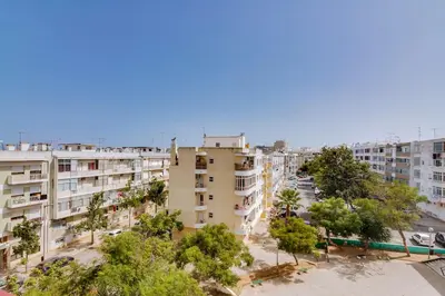 an overhead view of a city street with buildings at Brisa Algarvia 1 in Faro
