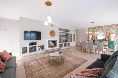 a living room with a couch and a table at Pedro Mar by Atlantic Places in Albufeira