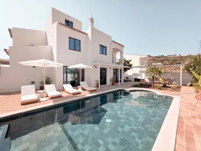 an image of a villa with a swimming pool at Casa Shiva in Albufeira