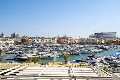 a group of boats parked in a harbor at Vilamarina Elegance T2 Marina View Vilamoura in Quarteira