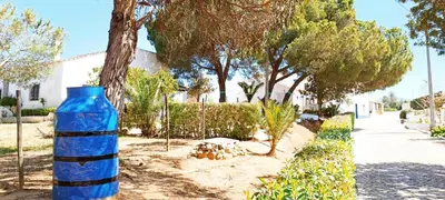 a blue bottle sitting on the side of a street at Quinta do Lagar - 02 in Albufeira