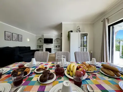 a bathroom with a toilet and a shower and a sink at Albufeira Summer Villa 3 With Pool by Homing in Sesmarias