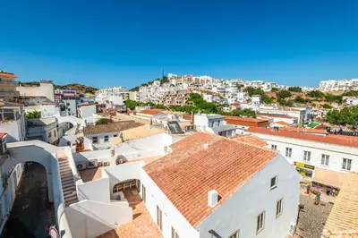 an aerial view of a city with buildings at Downtown Rooftop 1 Bedroom Apartment in Albufeira