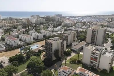 an aerial view of a city with tall buildings at Maya Vilamoura - City center by HD PROPERTIES in Vilamoura