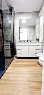 a bathroom with a toilet and a sink and a shower at Fantástico T2 Perto da Praia da Falésia, Albufeira in Albufeira