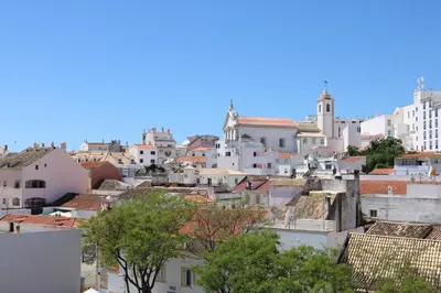 a view of a city with white buildings at Casa Malpique in Albufeira