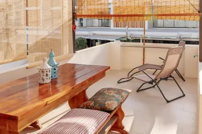 a white counter with a view of the ocean at Olhos de Água Beach Apartments by Mycelia in Olhos de Água