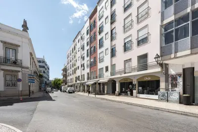 an empty street in a city with tall buildings at Mango 2 - Faro City Center by HD in Faro
