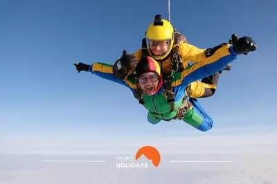 two men are flying in the air at #323 Jardins da Marina 2º BE by Home Holidays in Páteo