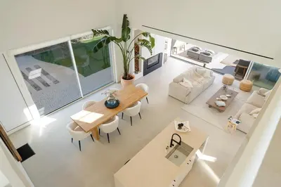 an overhead view of a living room with a table and chairs at New Villa - Rooftop Jacuzzi & Sunset Views in Santa Bárbara de Nexe